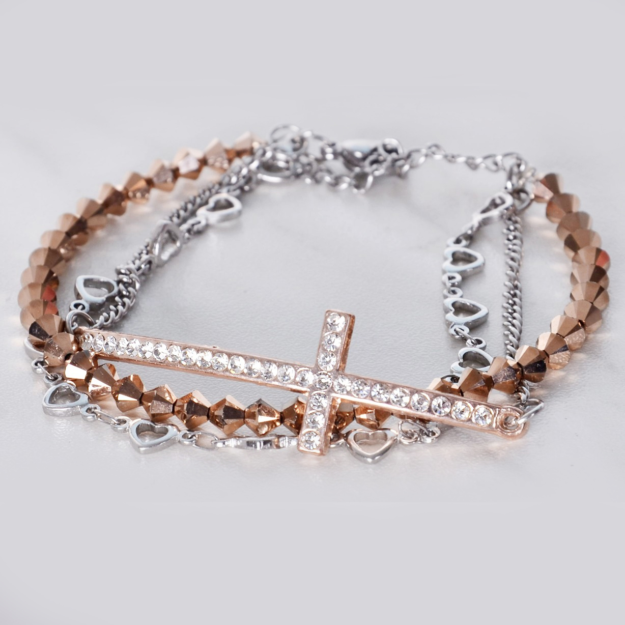 Náramek Swarovski Elements s křížkem Rose Gold SWN1A-300